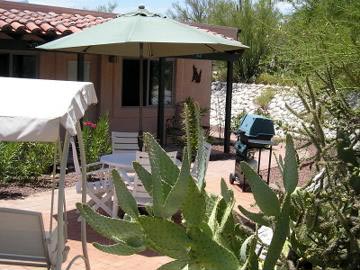 Covered Porch and Brick Patio